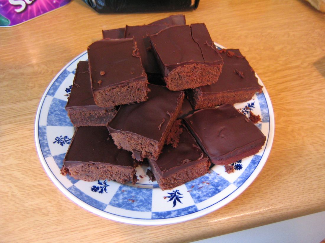 A plate of chocolate-topped brownie squares