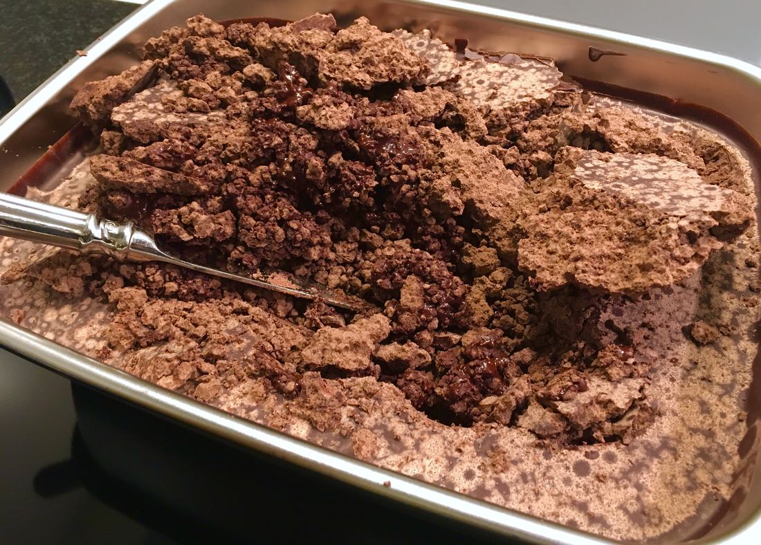 Dull, crumbly untempered chocolate in a tin